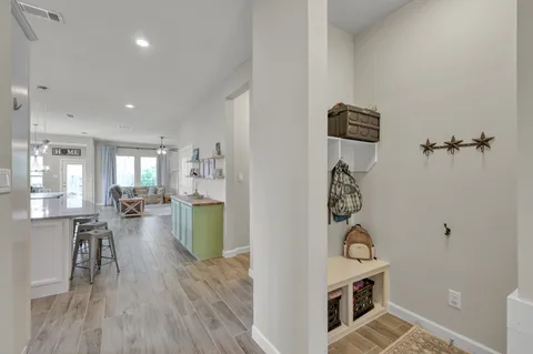 a view of a living room and dining room