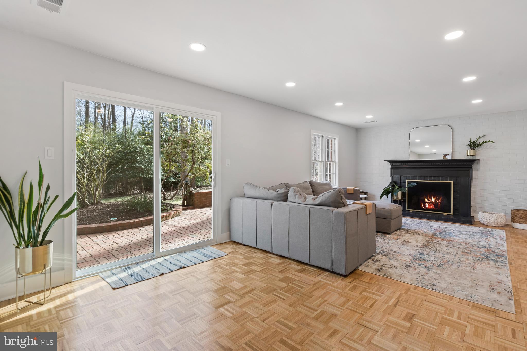 2509 Goldcup Lane Reston, VA 20191 - Photo 29 of 43 Easy outdoor access and cozy fireplace