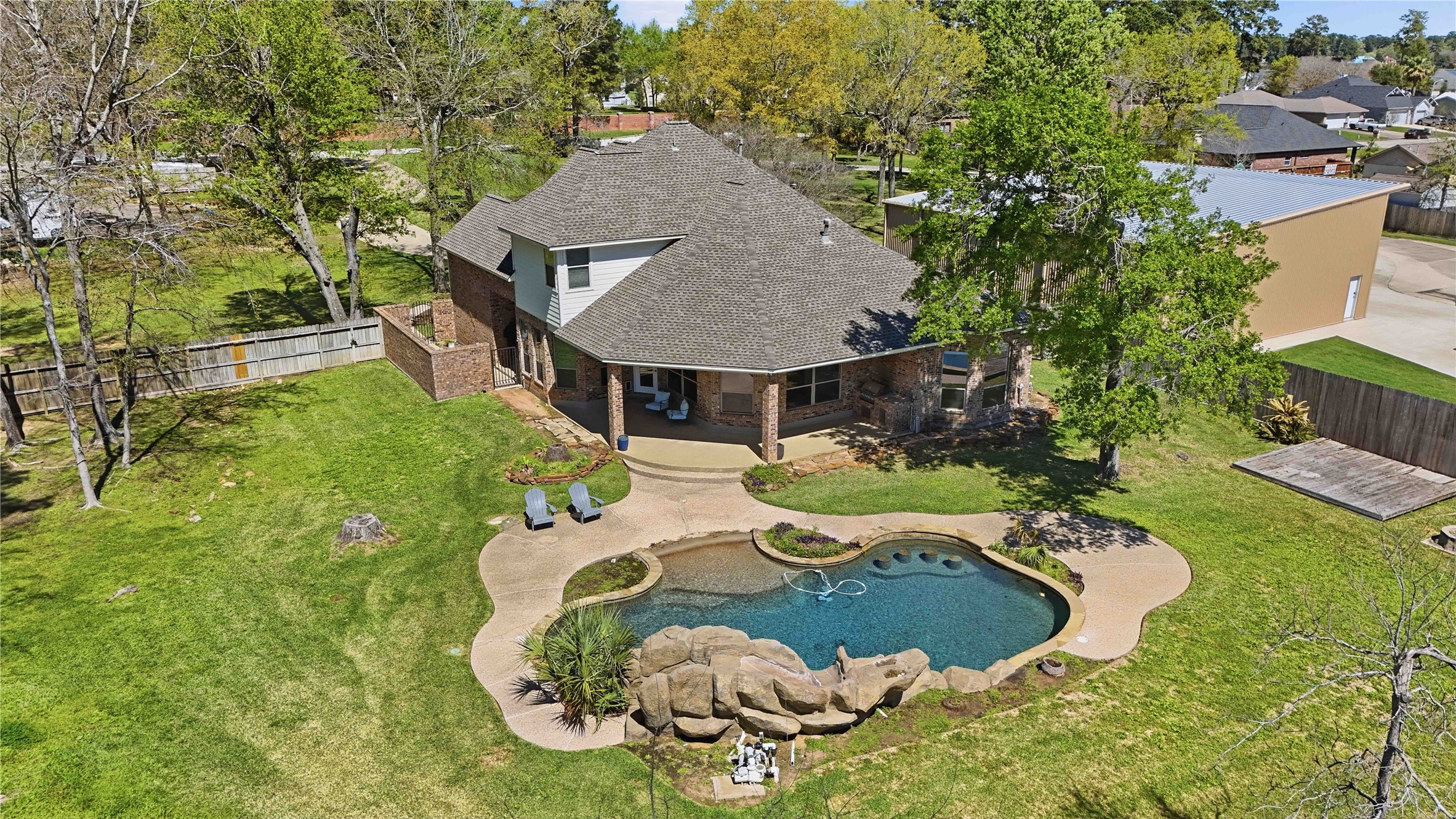 1930 Old River Road Montgomery, TX 77356 - Photo 3 of 49 Enjoy this overhead view of a dreamy backyard that offers a covered patio, a relaxing pool, and plenty of yard space all around.
