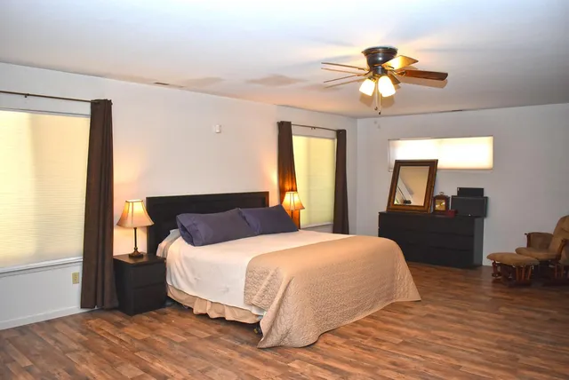 a view of a yard covered in snow