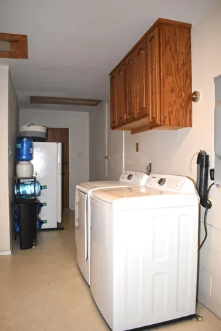 a view of a house with a small yard