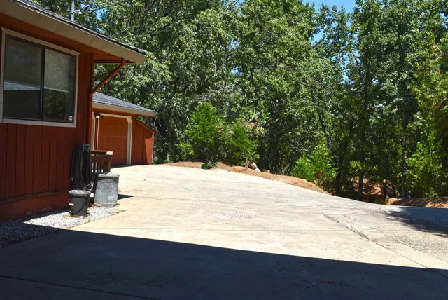 a view of a livingroom with wooden floor and a window