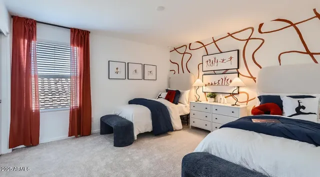 a bedroom with bed and a window