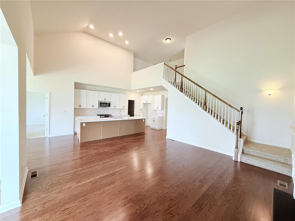 328 Abby Road, Unit LOT 15 Macungie, PA 18062 - Photo 16 of 26 An open concept design seamlessly connects the generous living area with a contemporary kitchen.