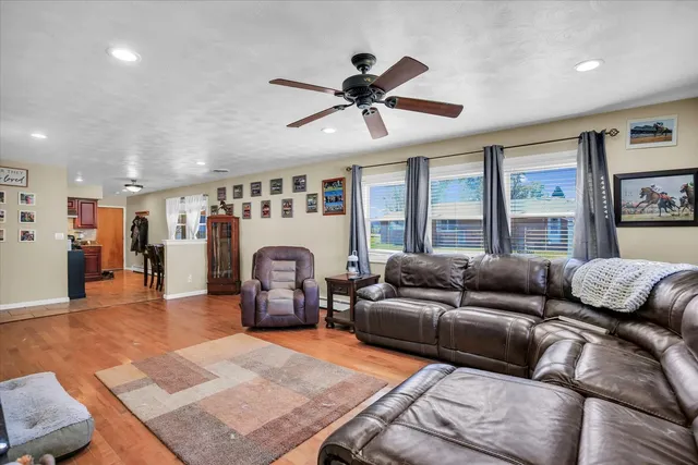 a kitchen with stainless steel appliances granite countertop a stove and a refrigerator