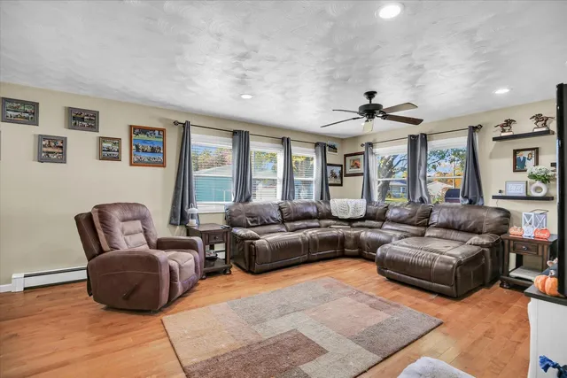 a bedroom with a bed dresser and a window