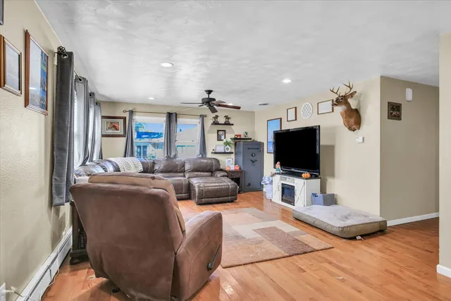 a bedroom with a bed and a large dresser