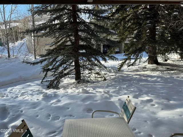 a view of backyard space and a yard