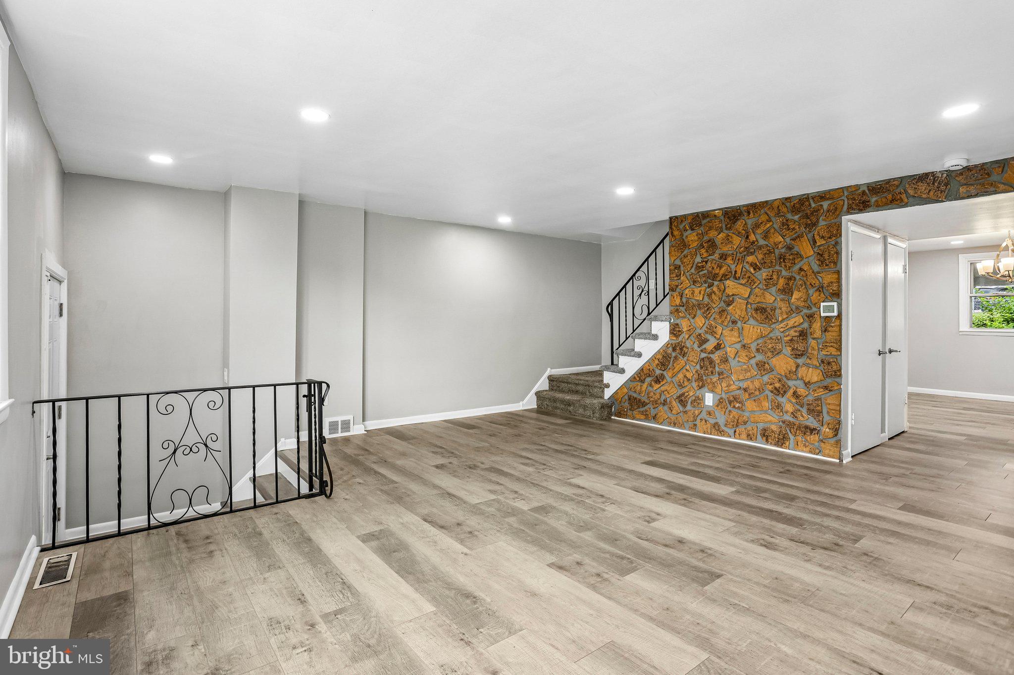 4008 Powell Road Brookhaven, PA 19015 - Photo 5 of 34 Spacious living area with modern charm.