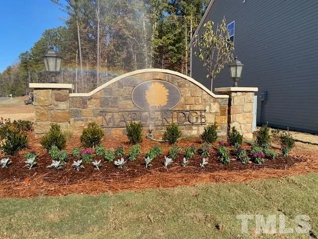 a view of a houses with a backyard