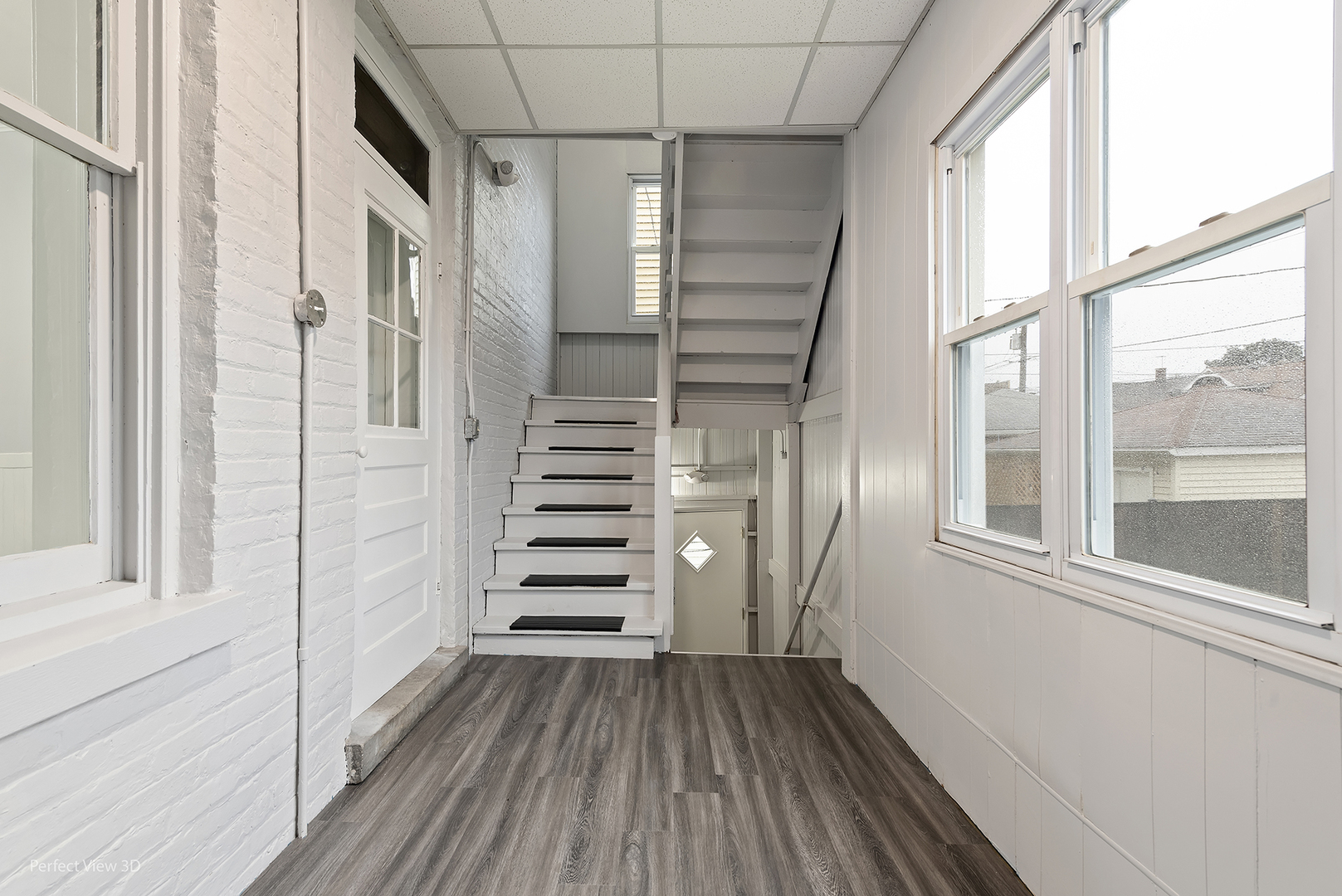 2108 Highland Avenue Berwyn, IL 60402 - Photo 13 of 32 a view of entryway with wooden floor and stairs