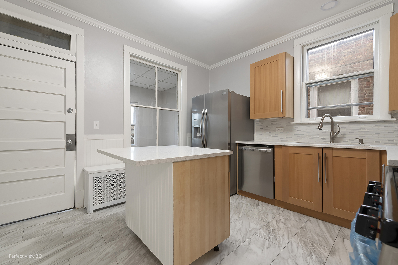 2108 Highland Avenue Berwyn, IL 60402 - Photo 16 of 32 a kitchen with stainless steel appliances a refrigerator and cabinets