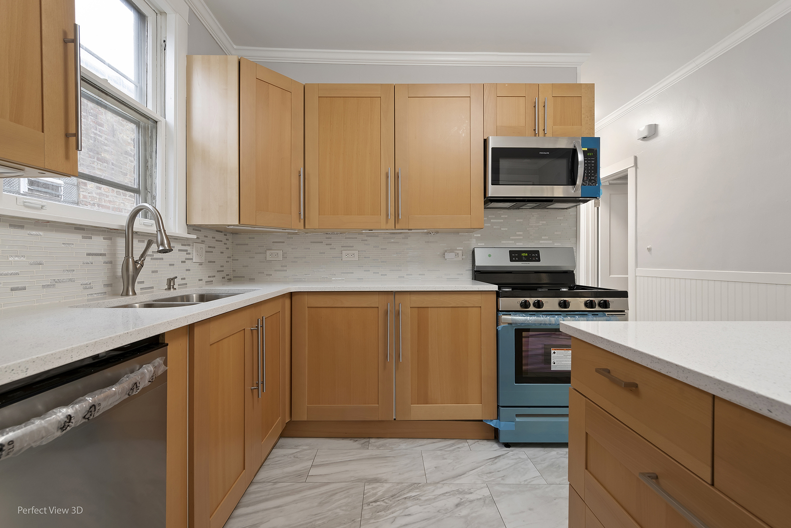 2108 Highland Avenue Berwyn, IL 60402 - Photo 17 of 32 a kitchen with stainless steel appliances granite countertop a sink stove and microwave