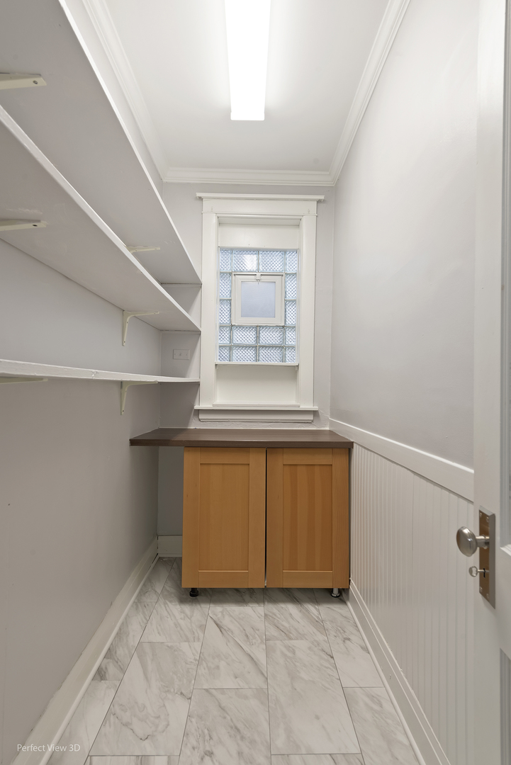 2108 Highland Avenue Berwyn, IL 60402 - Photo 18 of 32 an empty room with windows