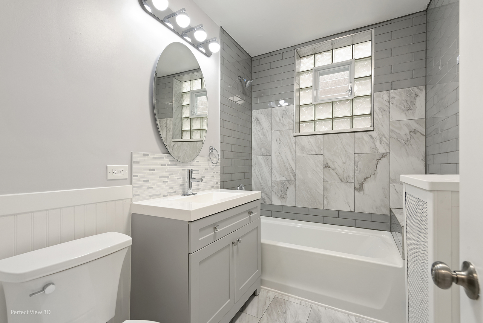 2108 Highland Avenue Berwyn, IL 60402 - Photo 20 of 32 a bathroom with a sink a toilet and a bathtub