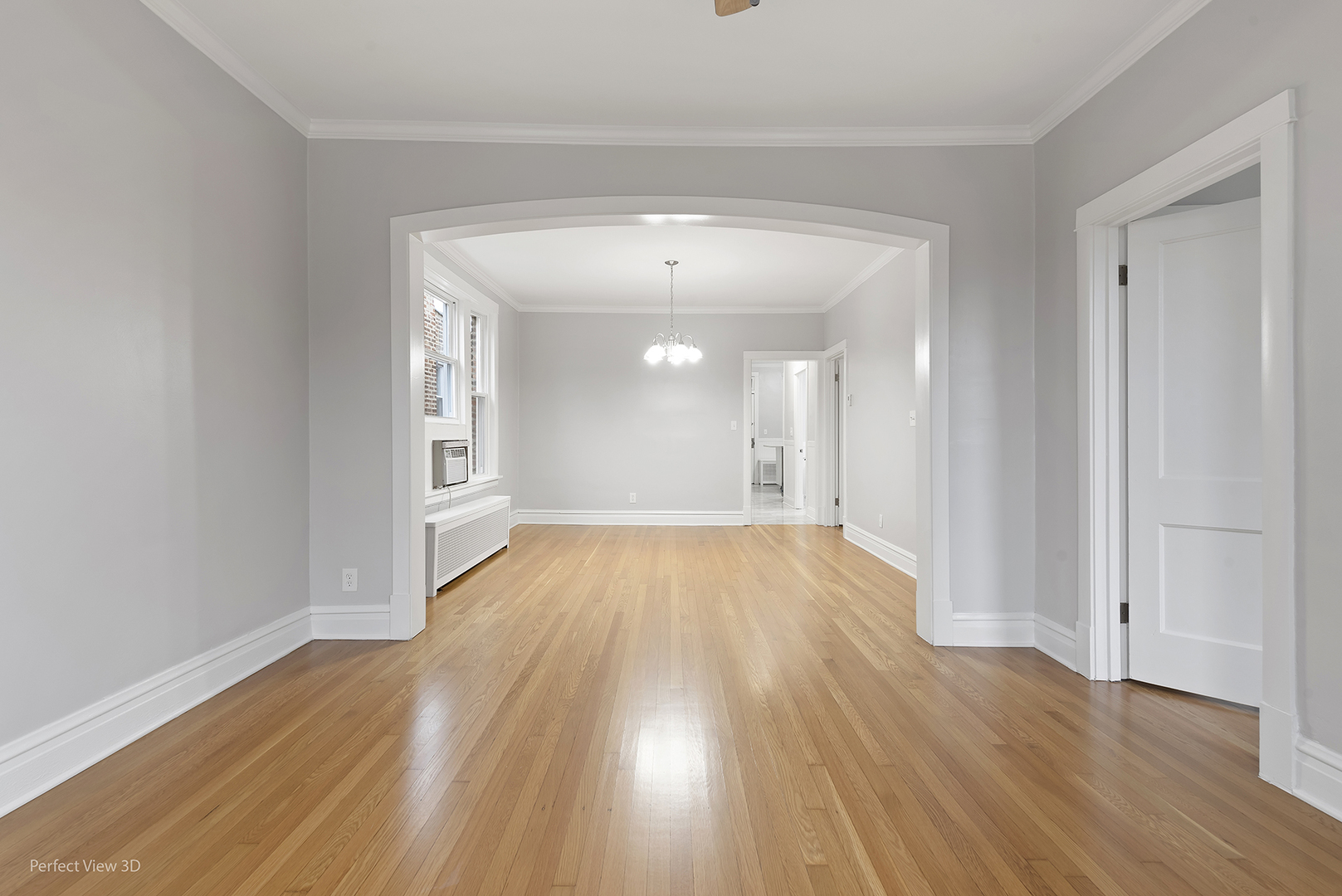 2108 Highland Avenue Berwyn, IL 60402 - Photo 26 of 32 wooden floor in an empty room with a window