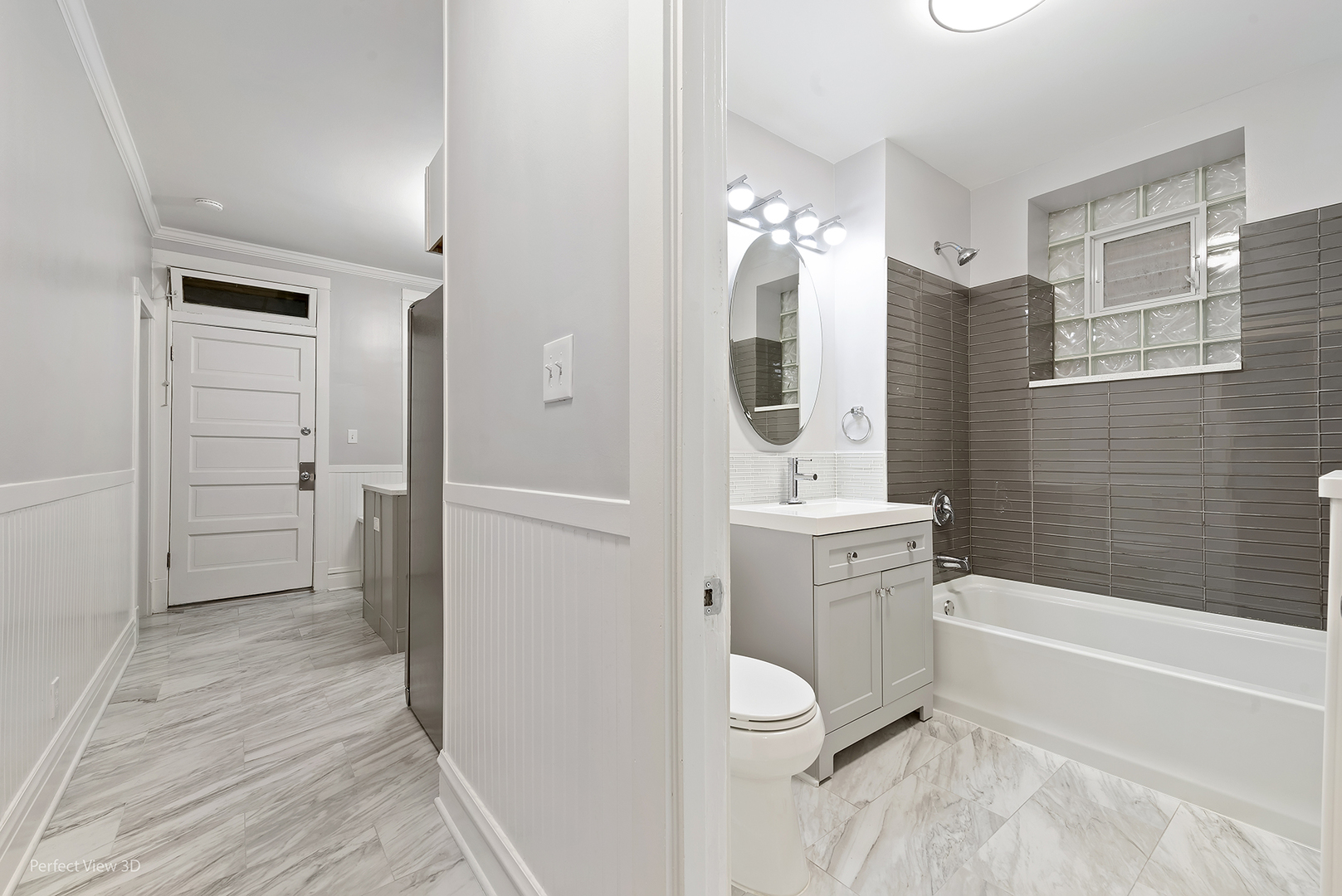 2108 Highland Avenue Berwyn, IL 60402 - Photo 7 of 32 a bathroom with a toilet a sink and bathtub