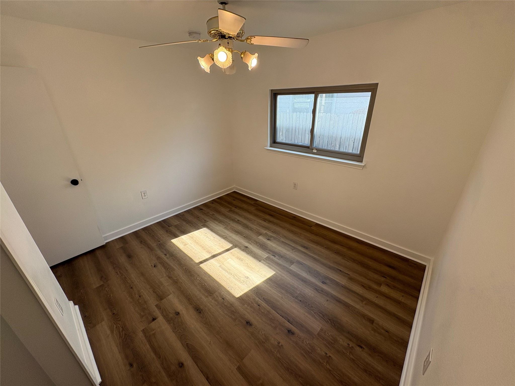 8003 Bannock Lane Austin, TX 78747 - Photo 29 of 40 Bedroom #3 featuring dark wood-style floors and ceiling fan