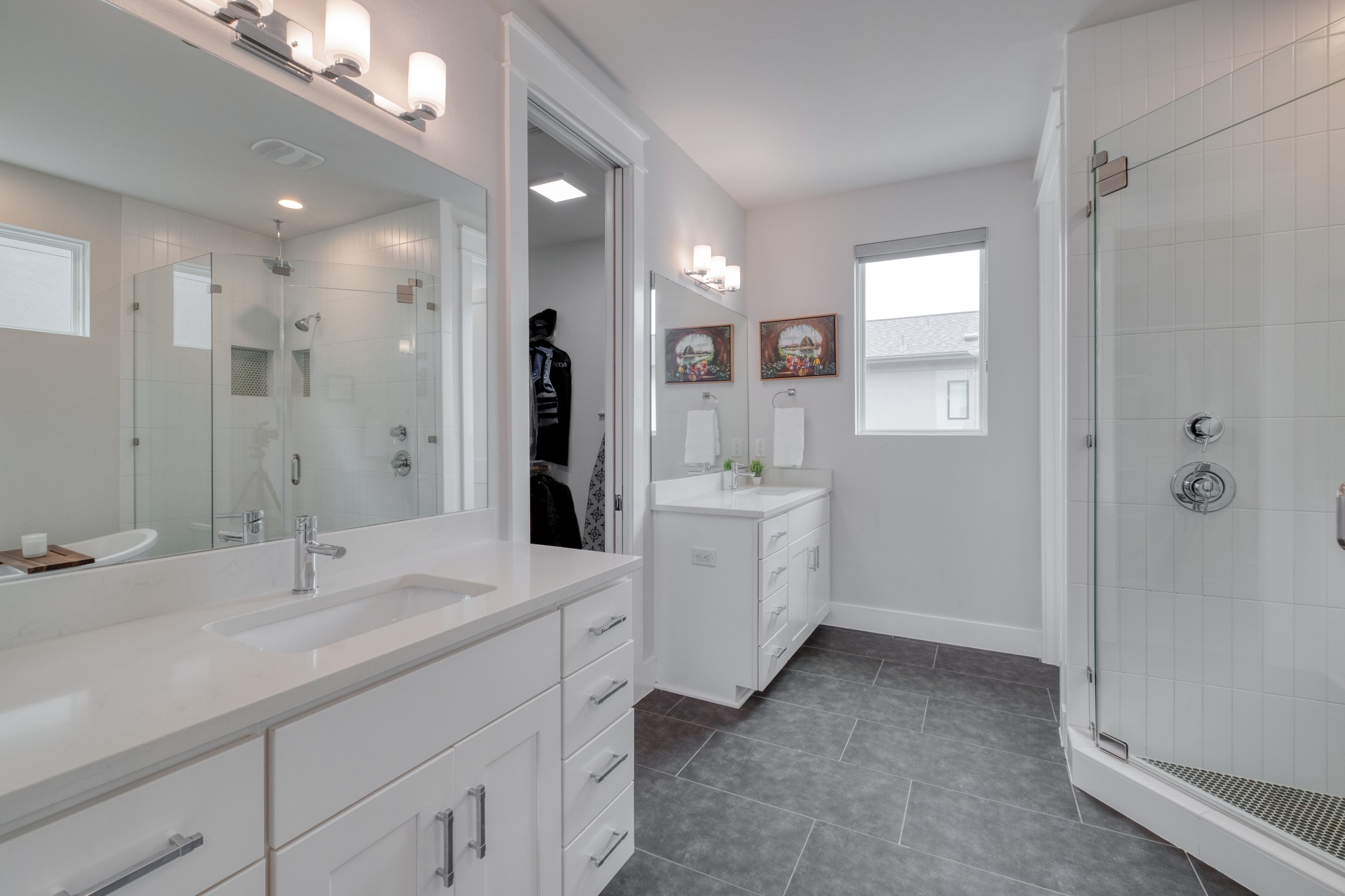 5002 Pecan Springs Road, Unit 7 Austin, TX 78723 - Photo 22 of 34 The primary bath is designed for relaxation, featuring separate vanities and a standalone soaking tub