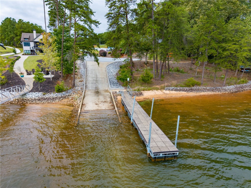 147 McAlister Road West Union, SC 29696 - Photo 46 of 50 A private boat ramp and wooden dock offer direct access to the water.