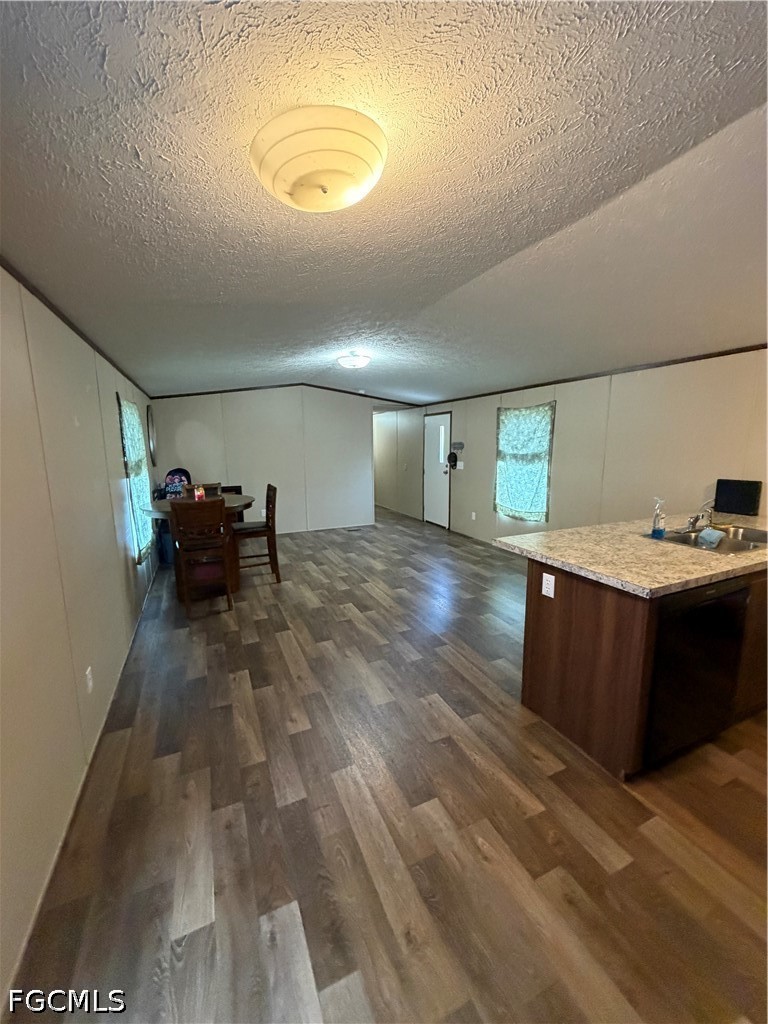 631 Stanton Street Clewiston, FL 33440 - Photo 7 of 24 a view of a room with wooden floor