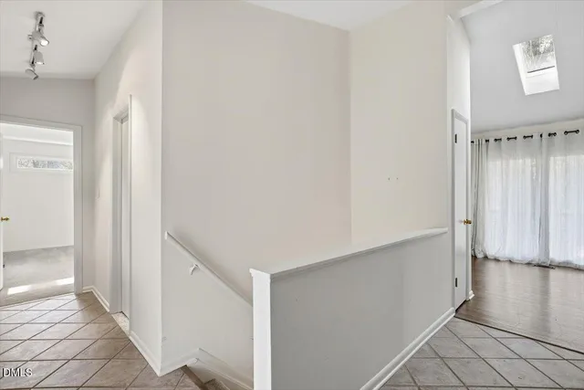 a view of a hallway with closet