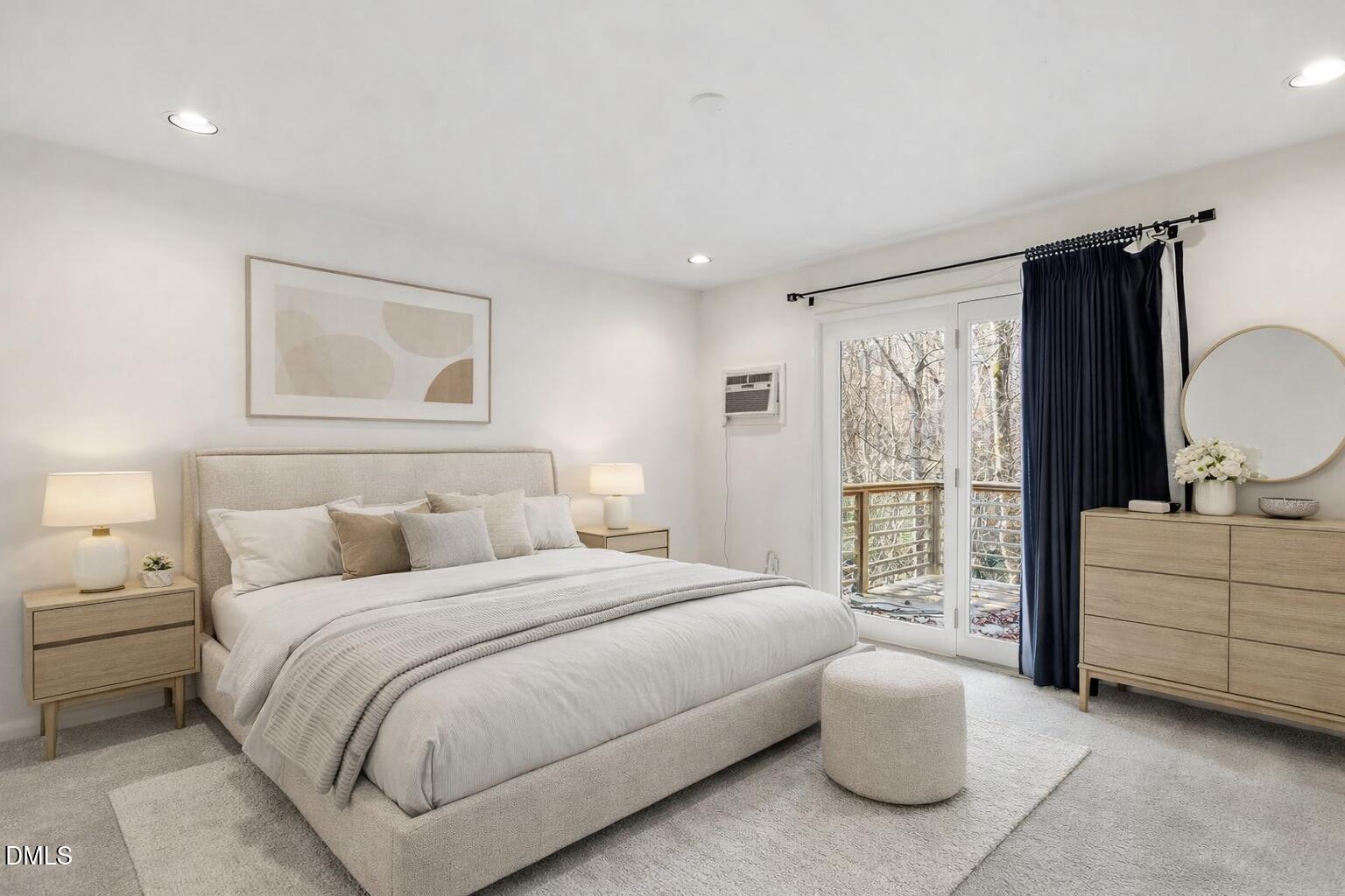 620 Sugarberry Road Chapel Hill, NC 27514 - Photo 3 of 33 a bedroom with a bed and a large window