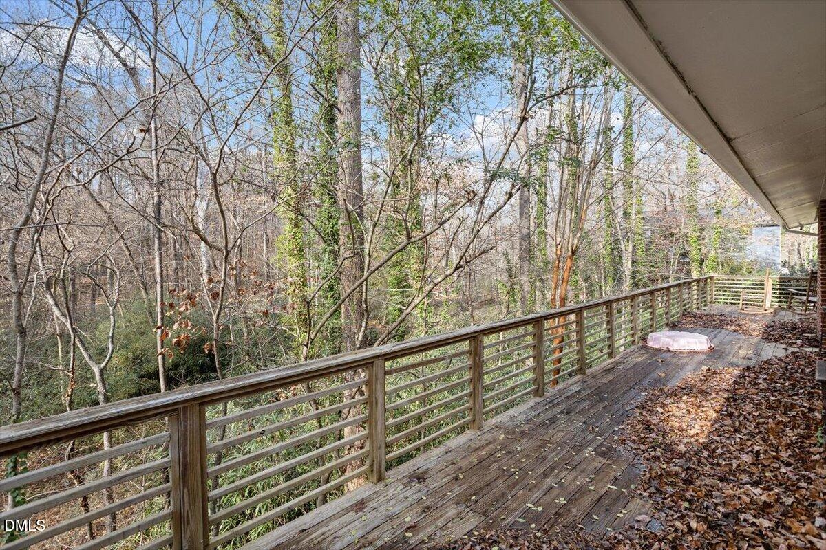 620 Sugarberry Road Chapel Hill, NC 27514 - Photo 31 of 33 a view of a balcony with wooden floor and fence