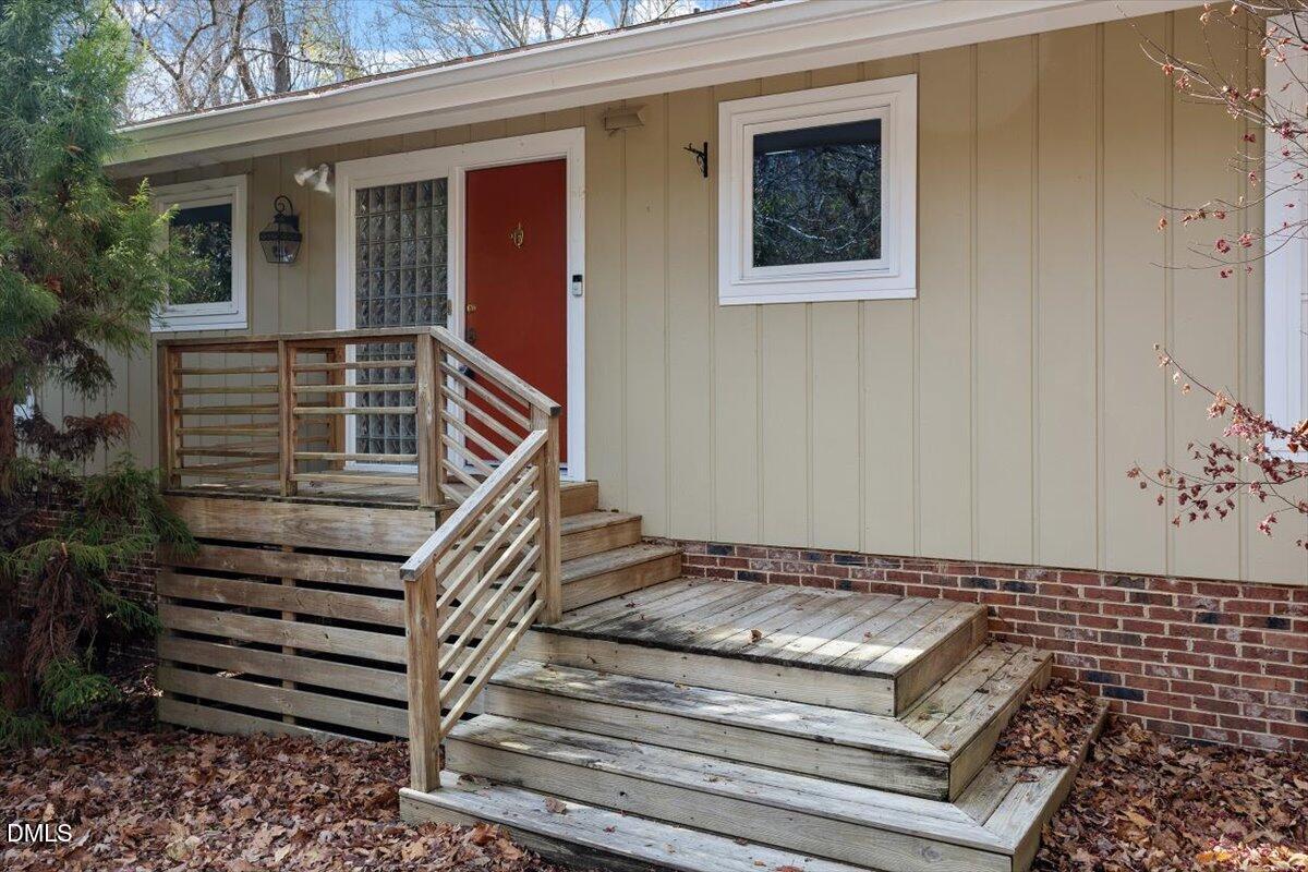 620 Sugarberry Road Chapel Hill, NC 27514 - Photo 33 of 33 a view of wooden door and a window