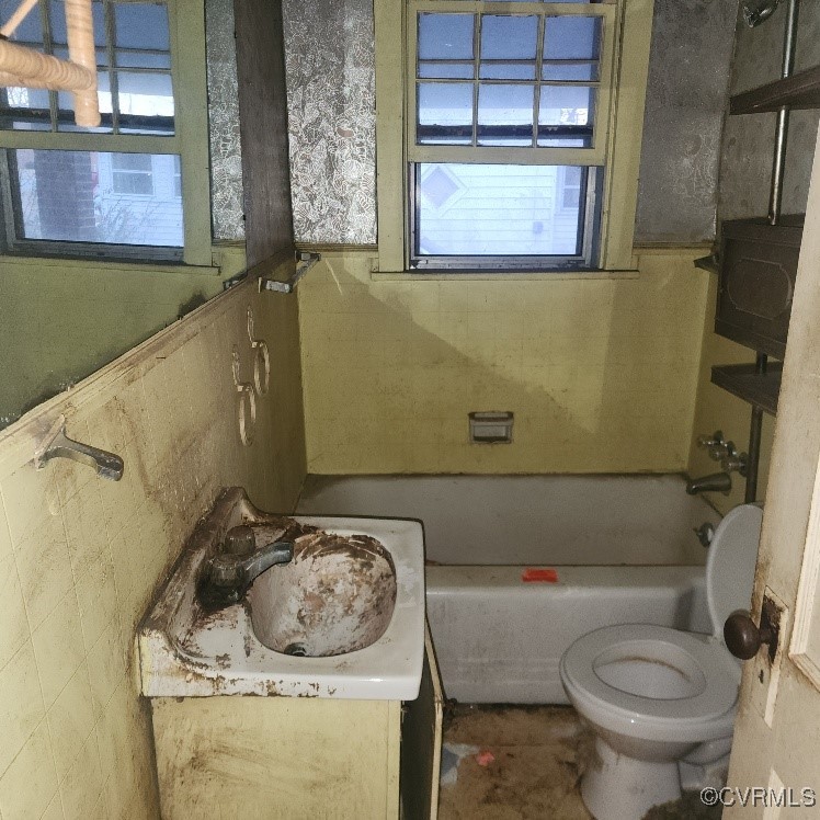 116 Ruffin Street Emporia, VA 23847 - Photo 20 of 23 Bathroom with a wealth of natural light, toilet, a