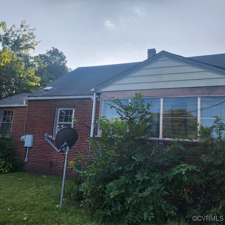 116 Ruffin Street Emporia, VA 23847 - Photo 10 of 23 View of side of home featuring a yard