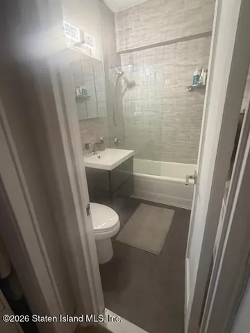 a bathroom with a sink and a toilet
