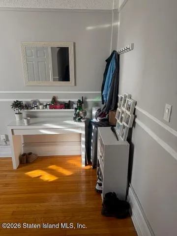 a bathroom with a sink a mirror and bathtub