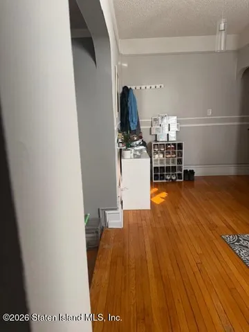 a view of workspace with wooden floor