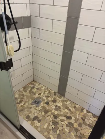 a view of a garden with a house in the background