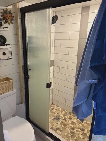 a view of a backyard with a garden and lake view