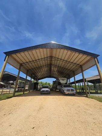 a front view of a house with outdoor seating