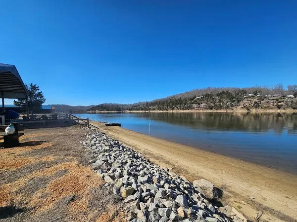 a view of a water fountain with lounge chair