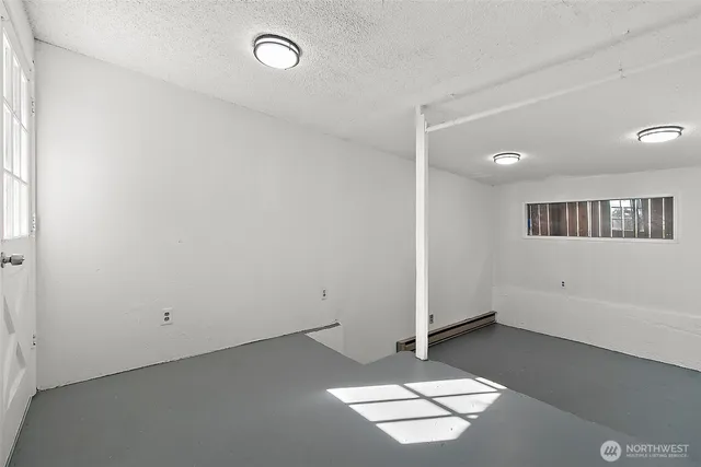 an empty room with windows