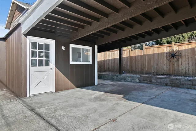 a view of backyard with garage
