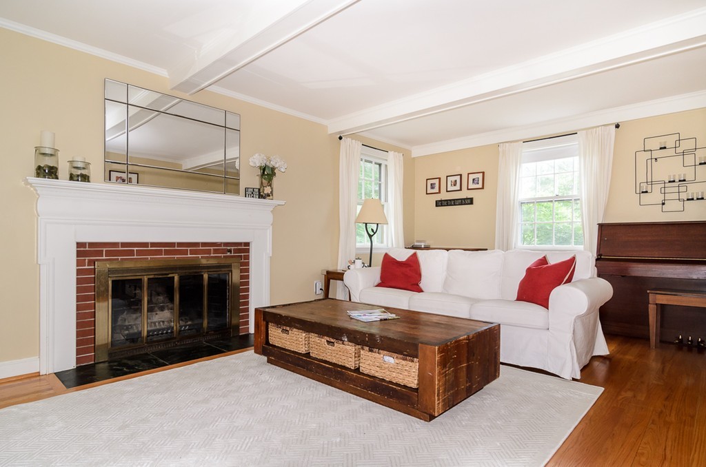 31 Haven Road Wellesley, MA 02481 - Photo 8 of 22 a living room with furniture and a fireplace