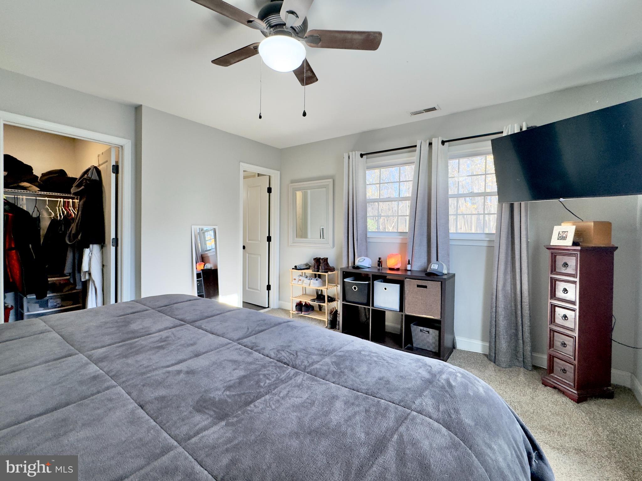 118 Timberlane Road Clarksboro, NJ 08020 - Photo 15 of 24 a bedroom with a bed and a chandelier