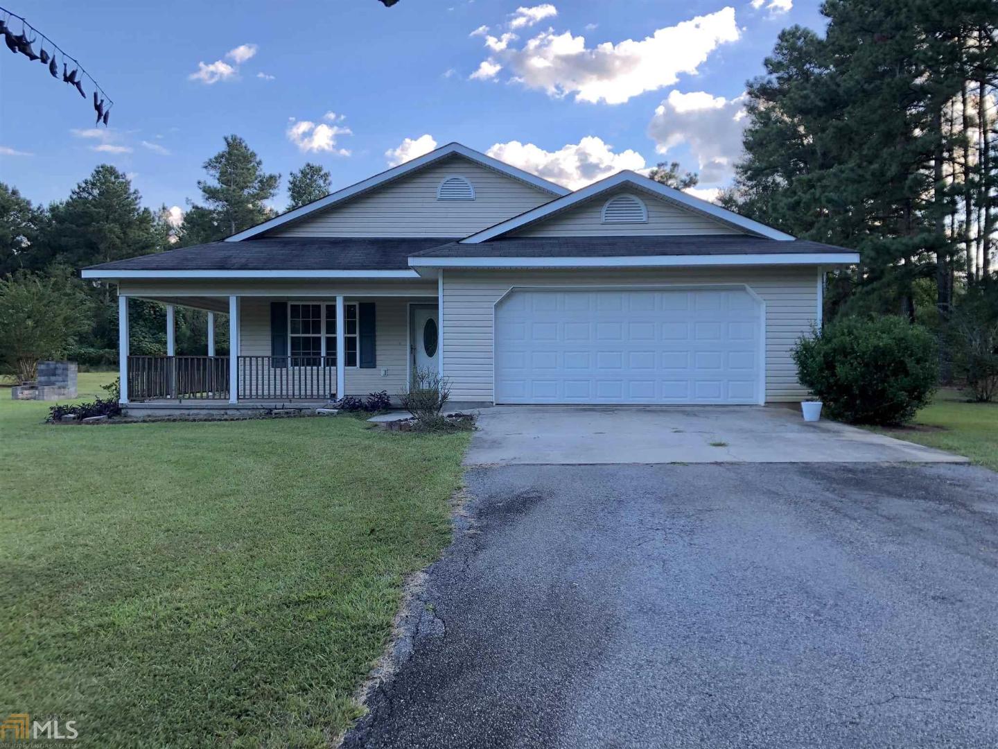 1633 Paul Maddox Road Jackson, GA 30233 - Photo 1 of 1 a view of a house with a yard and potted plants