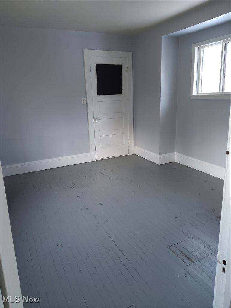 7117 Ottawa Road Cleveland, OH 44105 - Photo 19 of 25 Unfurnished room featuring hardwood / wood-style flooring
