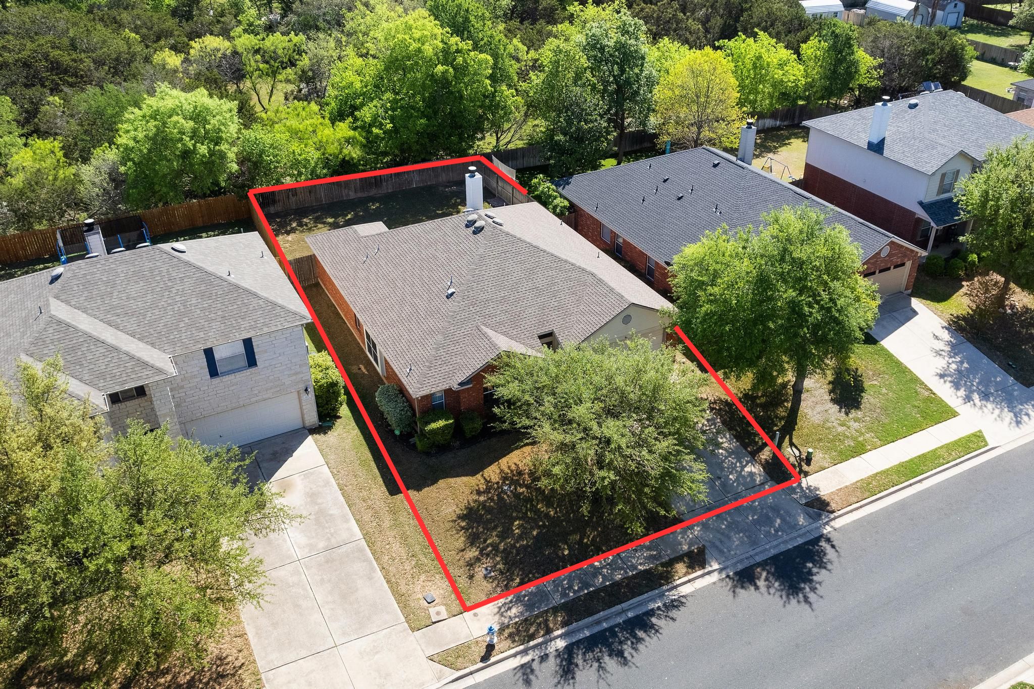 an aerial view of house with yard