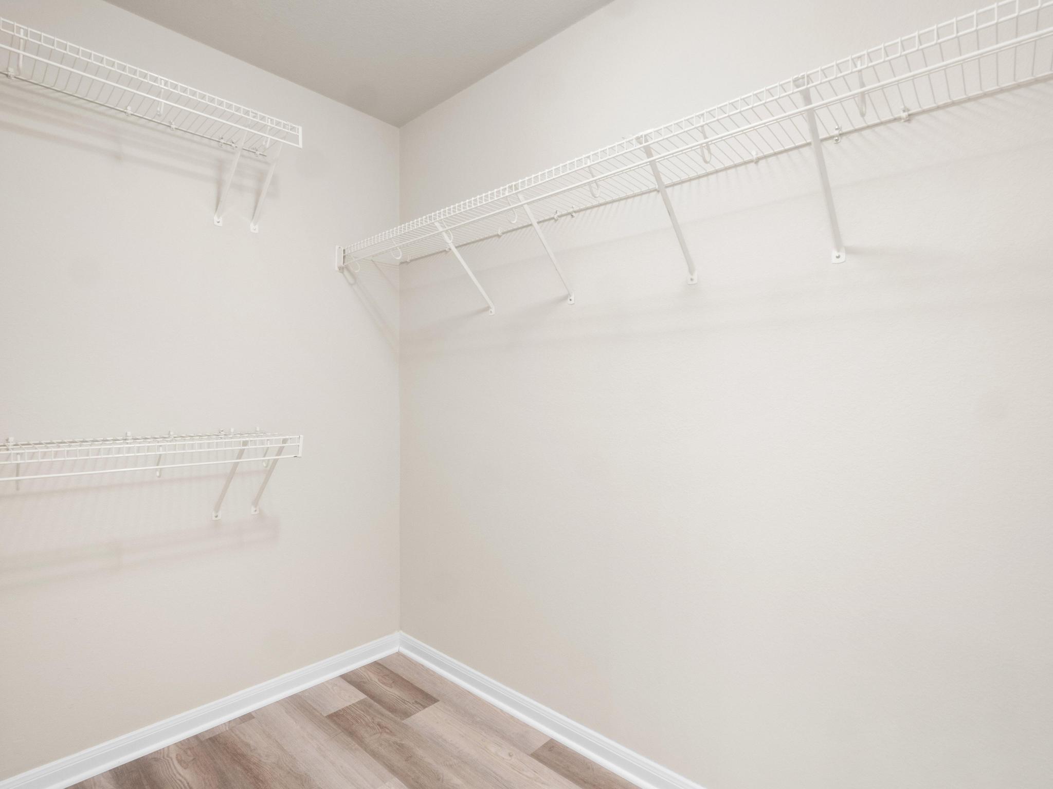 429 Falcon Lane Leander, TX 78641 - Photo 17 of 27 a view of a room with racks on the wall