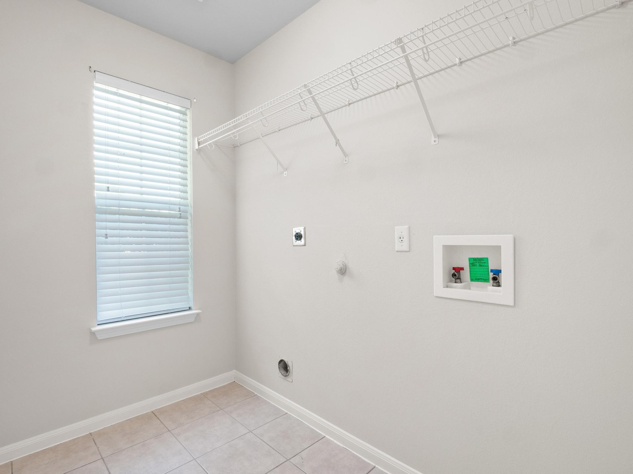 429 Falcon Lane Leander, TX 78641 - Photo 24 of 27 a view of a window in an empty room