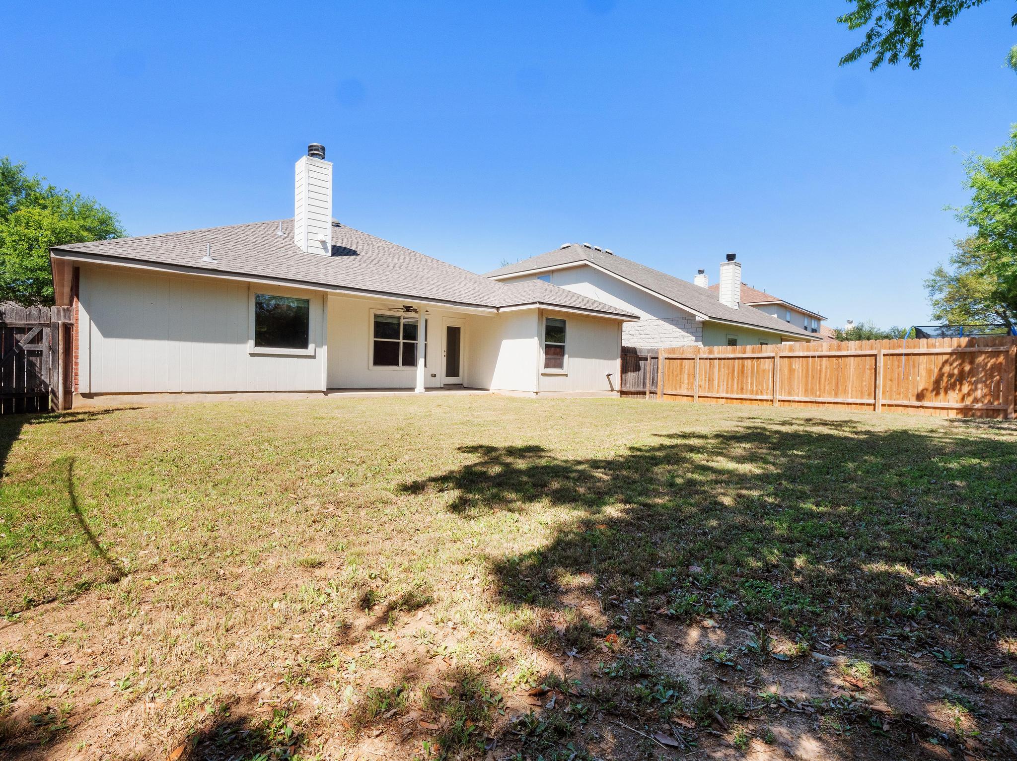429 Falcon Lane Leander, TX 78641 - Photo 26 of 27 a front view of a house with a yard