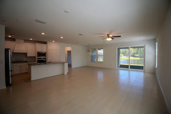 a view of kitchen with furniture and window