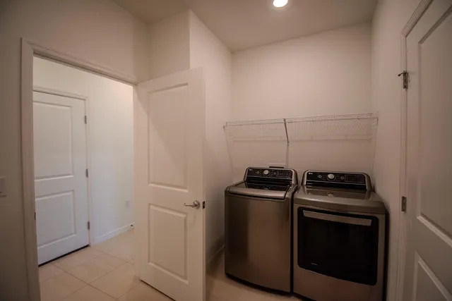 a kitchen with a stove and a microwave
